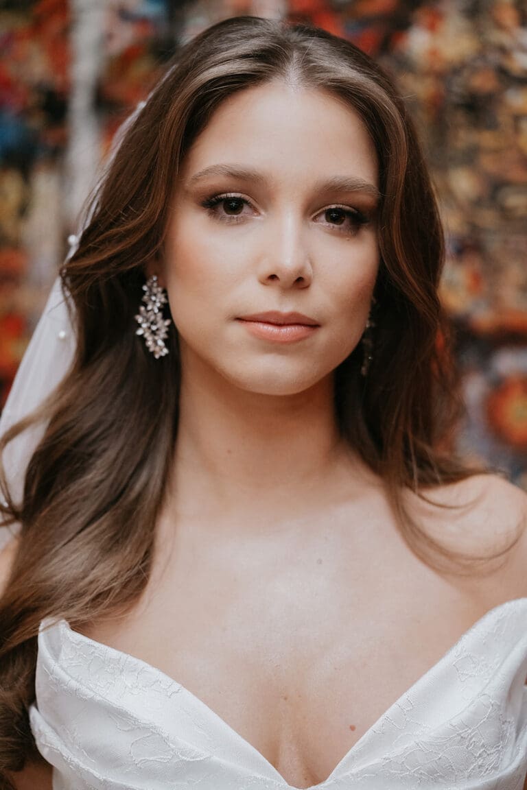 Natural bridal makeup with soft neutral tones and delicate accessories in Montreal